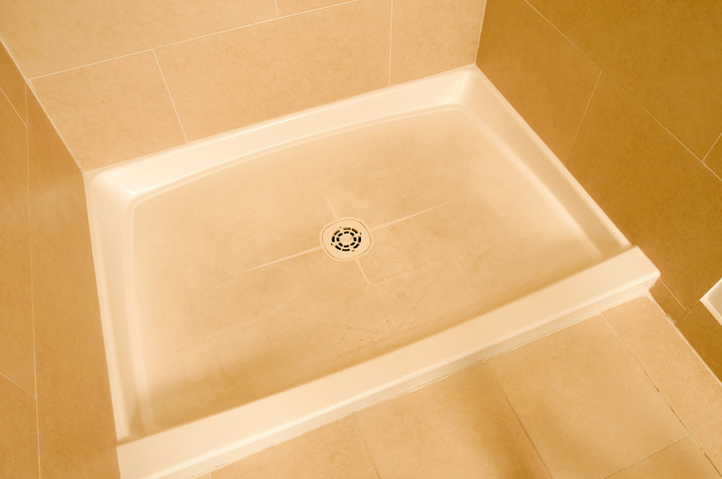 How to Clean Plastic Shower Floor and Walls 